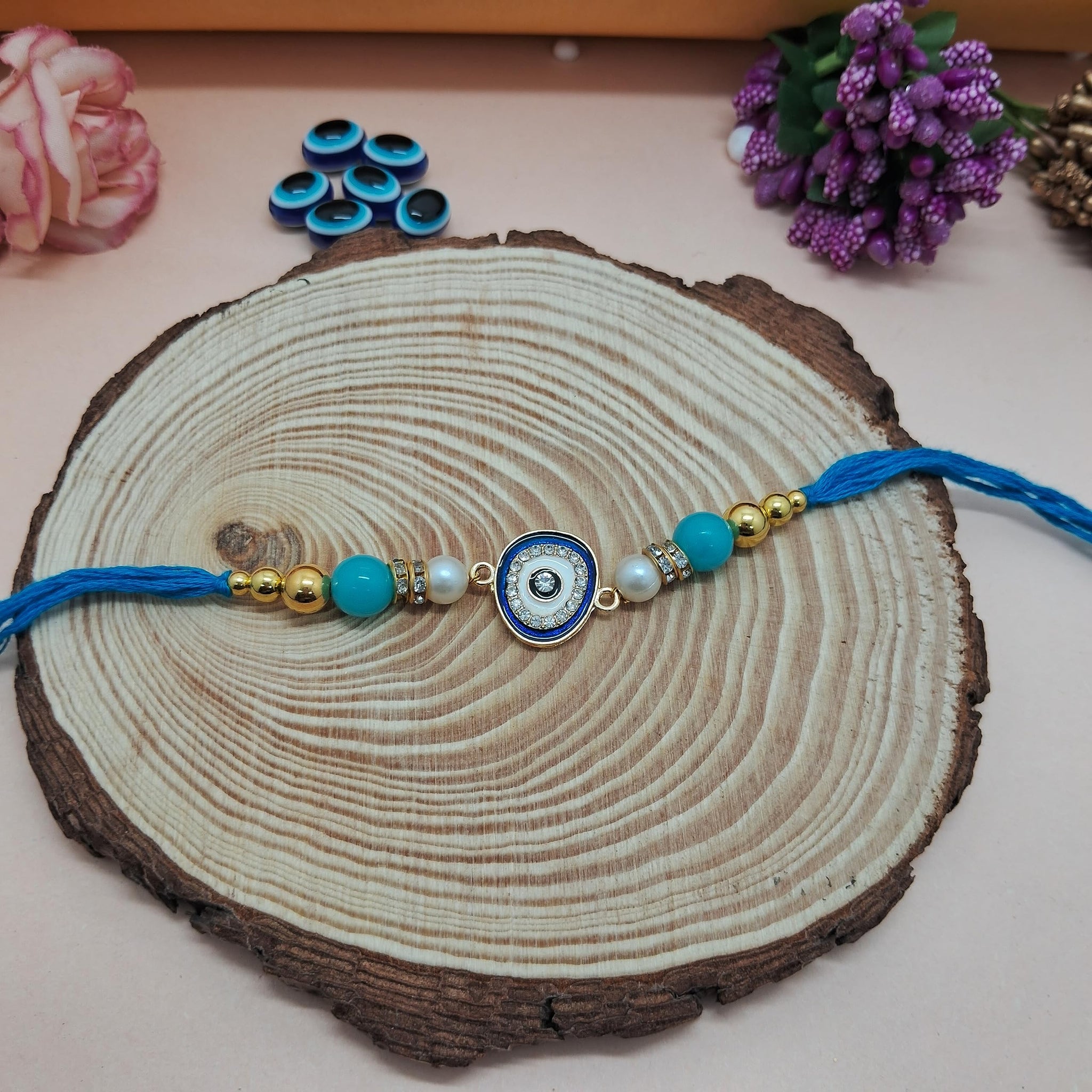 Alaukik Rakhi Bracelet Gift Set for Adults, Unisex Handmade Raksha Bandhan Bracelets with Zari and Stone Work - label detail