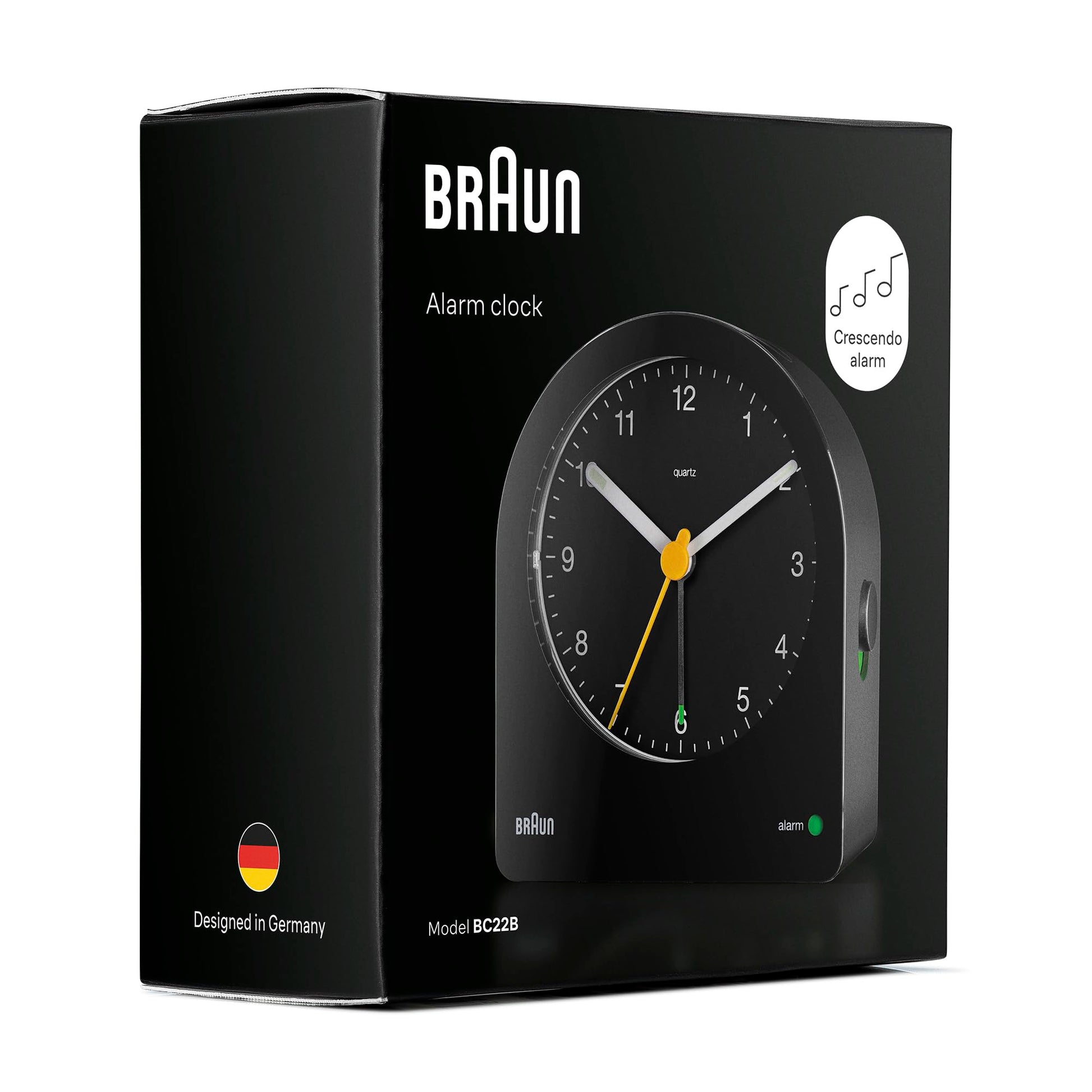 Braun Classic Analogue Alarm Clock, Black, Quiet Quartz Movement, Crescendo Beep, Snooze & Backlight, Model BC22B - in use
