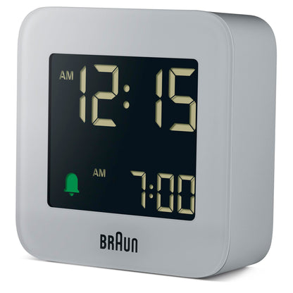 Braun Plastic Digital Travel Alarm Clock with Snooze, Compact Size, Negative LCD Display, Gray, Model BC08G - in use
