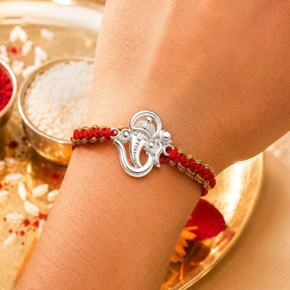 Ganesha Design Silver Rakhi for Brother with Roli Kumkum & Card - back view