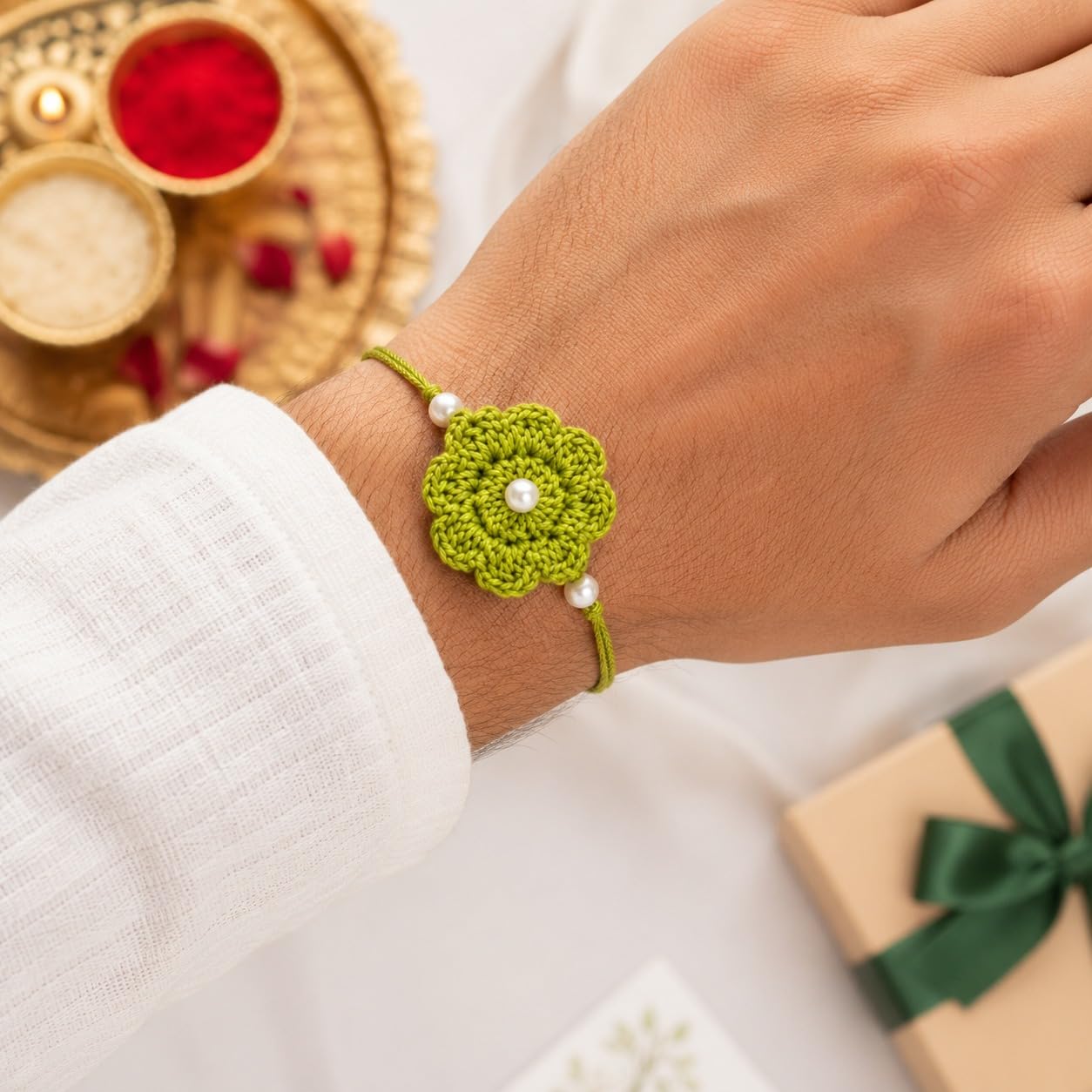 GliterKart Handmade Crochet Green Flower Rakhi for Brother, Cotton Thread Bracelet with Pearl Beads, Raksha Bandhan Gift - pa