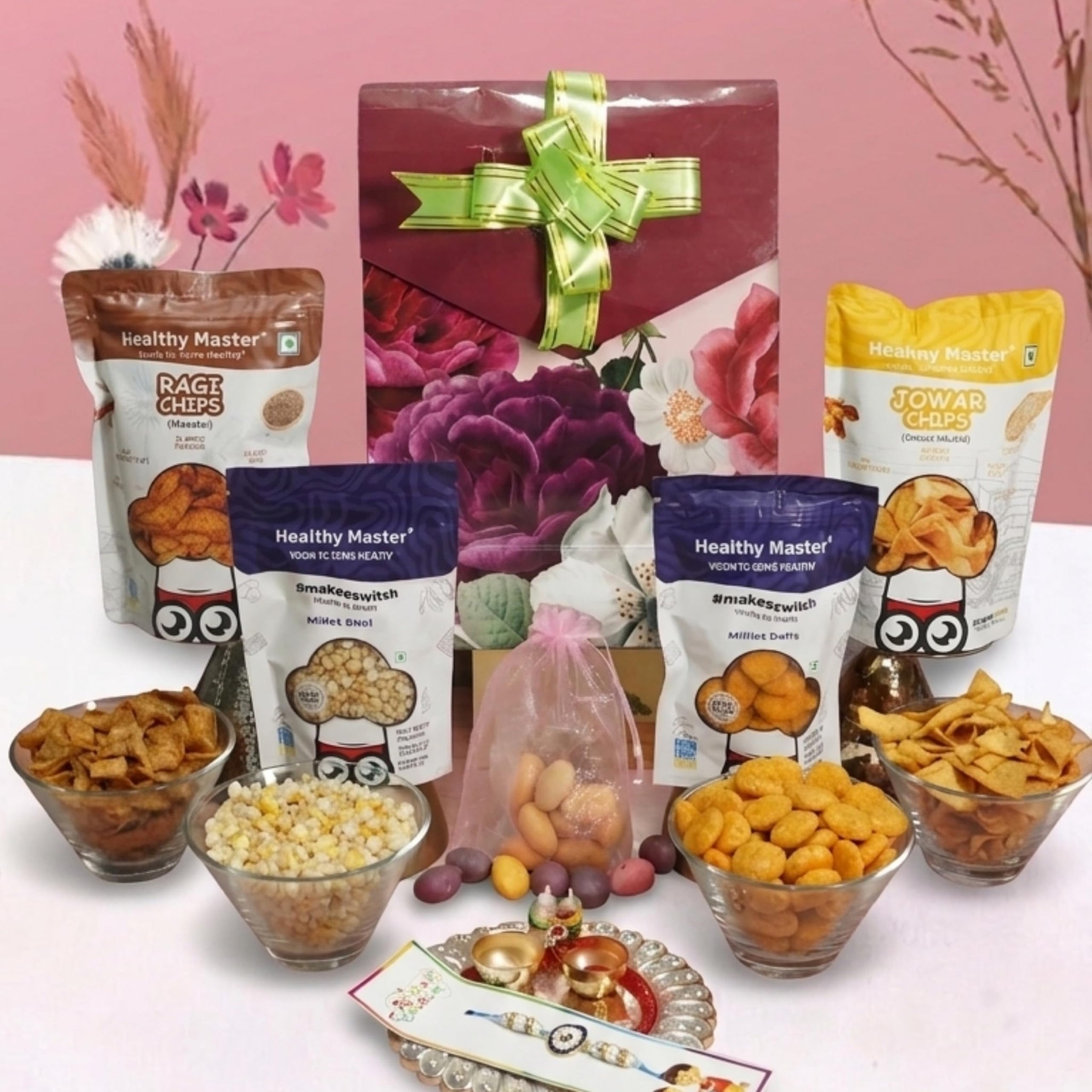 Healthy Master 8-Item Rakhi Gift Hamper with Rakhi, Greeting Card, Chikki, Eraser Chocolate & Kumkum Chawal | Traditional Rak