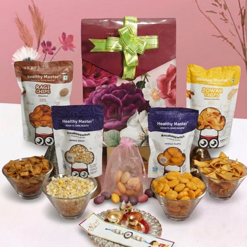 Healthy Master 8-Item Rakhi Gift Hamper with Rakhi, Greeting Card, Chikki, Eraser Chocolate & Kumkum Chawal | Traditional Rak