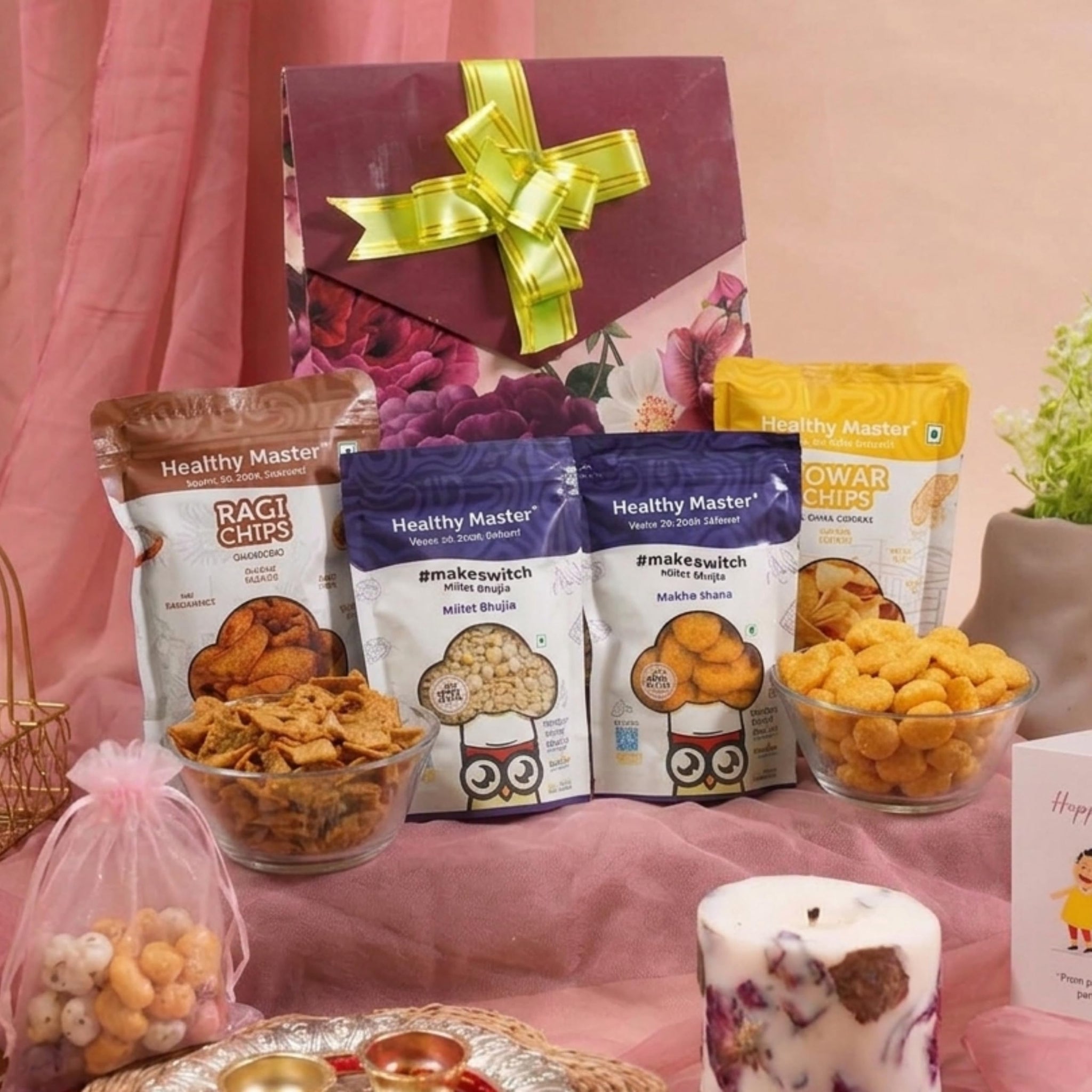 Healthy Master 8-Item Rakhi Gift Hamper with Rakhi, Greeting Card, Chikki, Eraser Chocolate & Kumkum Chawal | Traditional Rak