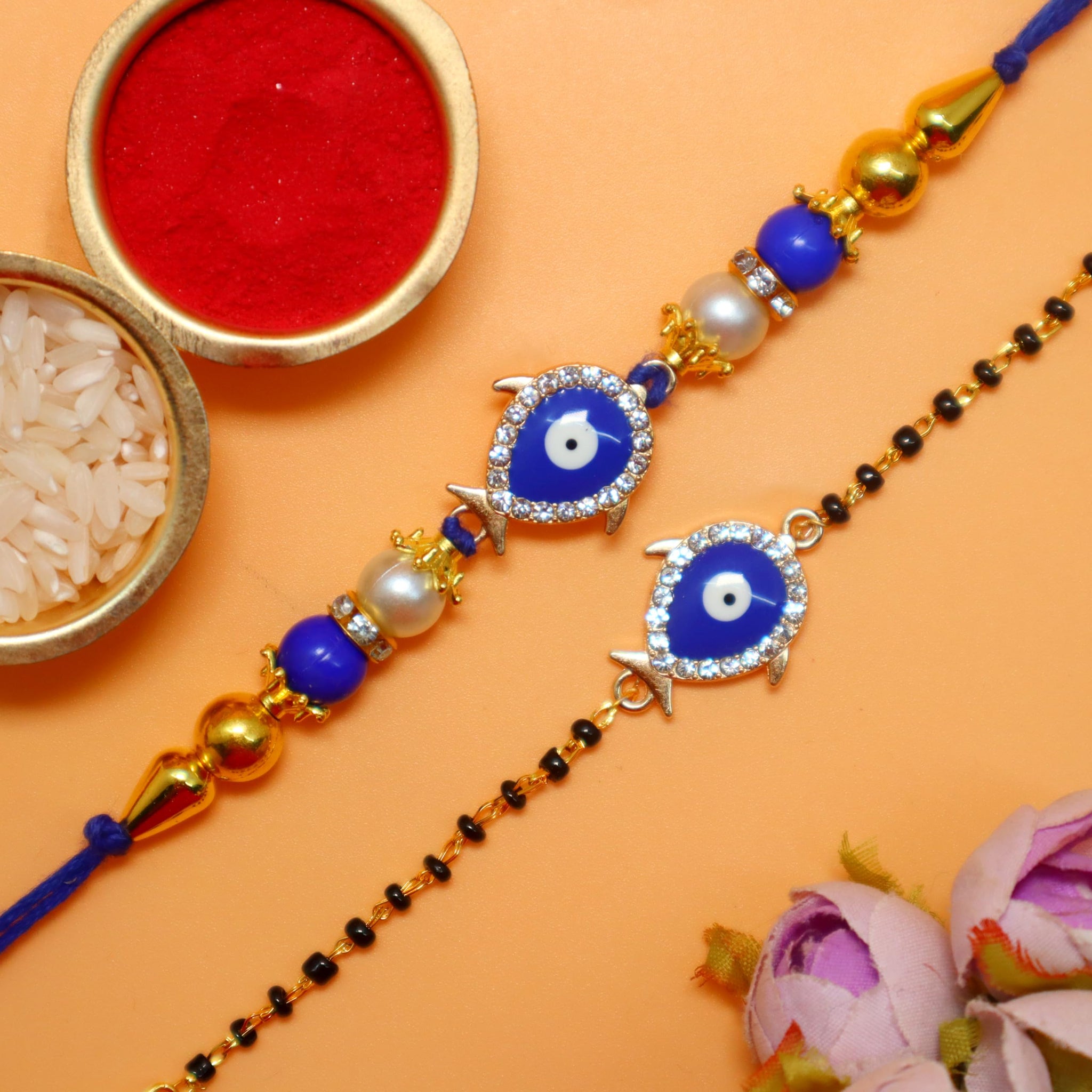 Jaipur Ace Evil Eye Bhaiya Bhabhi Rakhi with 2 Kids Rakhi, Bowl Set, Chocolate, Tilak & Shagun Envelope | Gift Hamper Combo f