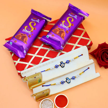 JAIPUR ACE Evil Eye Rakhi (2), Silk Chocolate (2x60gm),Decorative Cash Box Combo Pack, RakshaBandhan Rakhi Gift Hamper Shagun