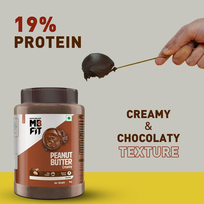 MuscleBlaze Fit Creamy Chocolate Peanut Butter, Roasted Peanut and Cocoa Spread - in use