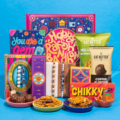 Phool Bandhan Rakhi Gift Hamper for Brother | 10-Item Rakhi Gift Set with 2 Rakhis, Incense, Laddoo & Chikki | Rakhi Gift Box
