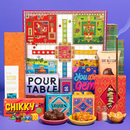 Phool Ludo Rakhi Gift Hamper for Brother | 13-Item Rakhi Gift Box with Elaichi Rakhi, Coffee, Laddoo, Chikki, Soap & Ludo Gam