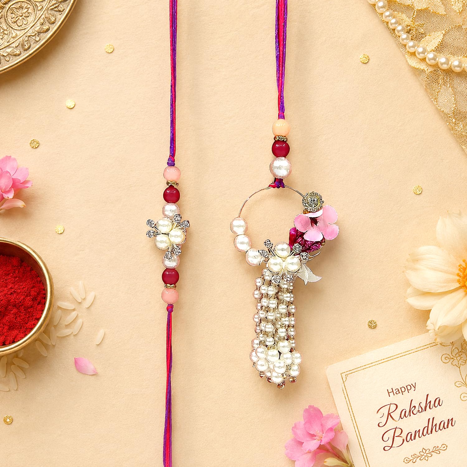 UPHARKARO Elegant Pearl Floral Bhaiya Bhabhi Lumba Rakhi Set with Tassel & Pink Crystal Design - packaging