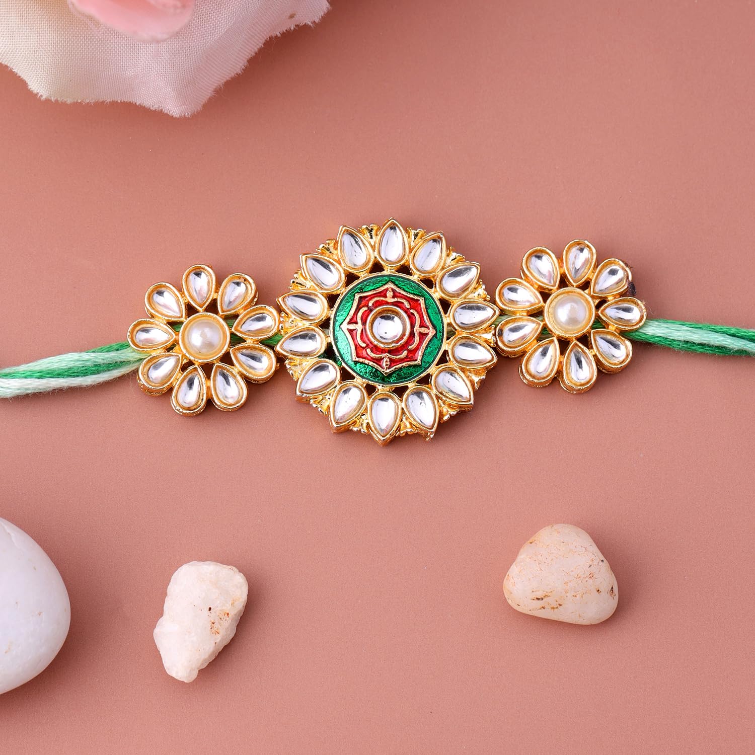 VOYLLA Kundan Enameled Floral Rakhi With Roli Chawal Pack -Rakhi For Brother - front view