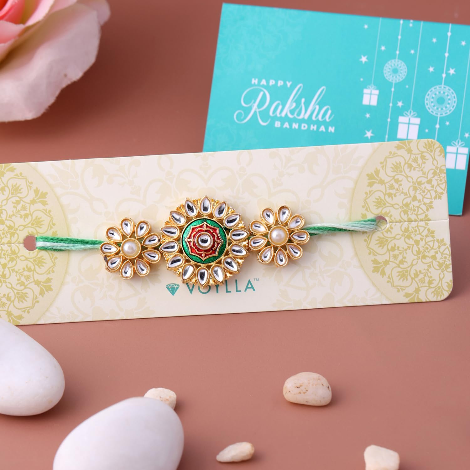 VOYLLA Kundan Enameled Floral Rakhi With Roli Chawal Pack -Rakhi For Brother - packaging
