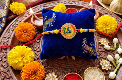 Yuvraj multicolors desingner rakhi set for brother & gulab jamun 1 kg with roli chawal pack - back view